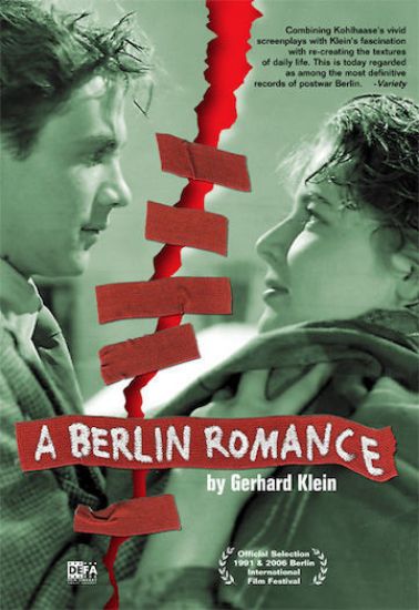 A green-tinted, close-up image shows a young man and woman facing each other in profile. A jagged red tear runs vertically down the center of the image, visually splitting them apart, with strips of red tape placed across the tear as if to mend it. The woman clutches the the man’s coat collar. The film title “A Berlin Romance” appears in white letters on a red banner across the lower middle of the poster. Beneath reads “A film by Gerhard Klein.” Displayed in the upper right corner are festival laurels, and the DEFA Film Library logo at the bottom right.